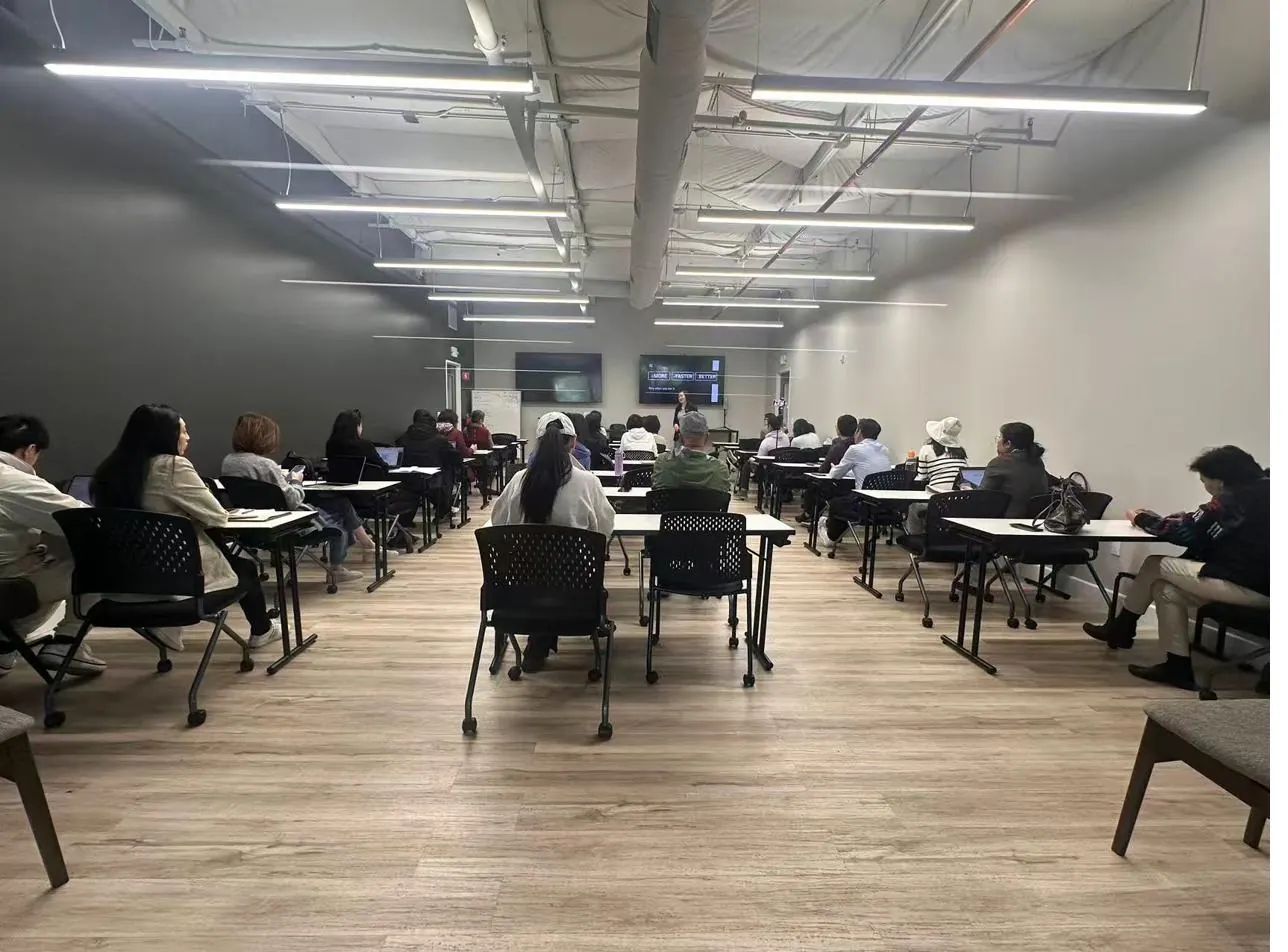 Full classroom of agents at a KW Thrive training session