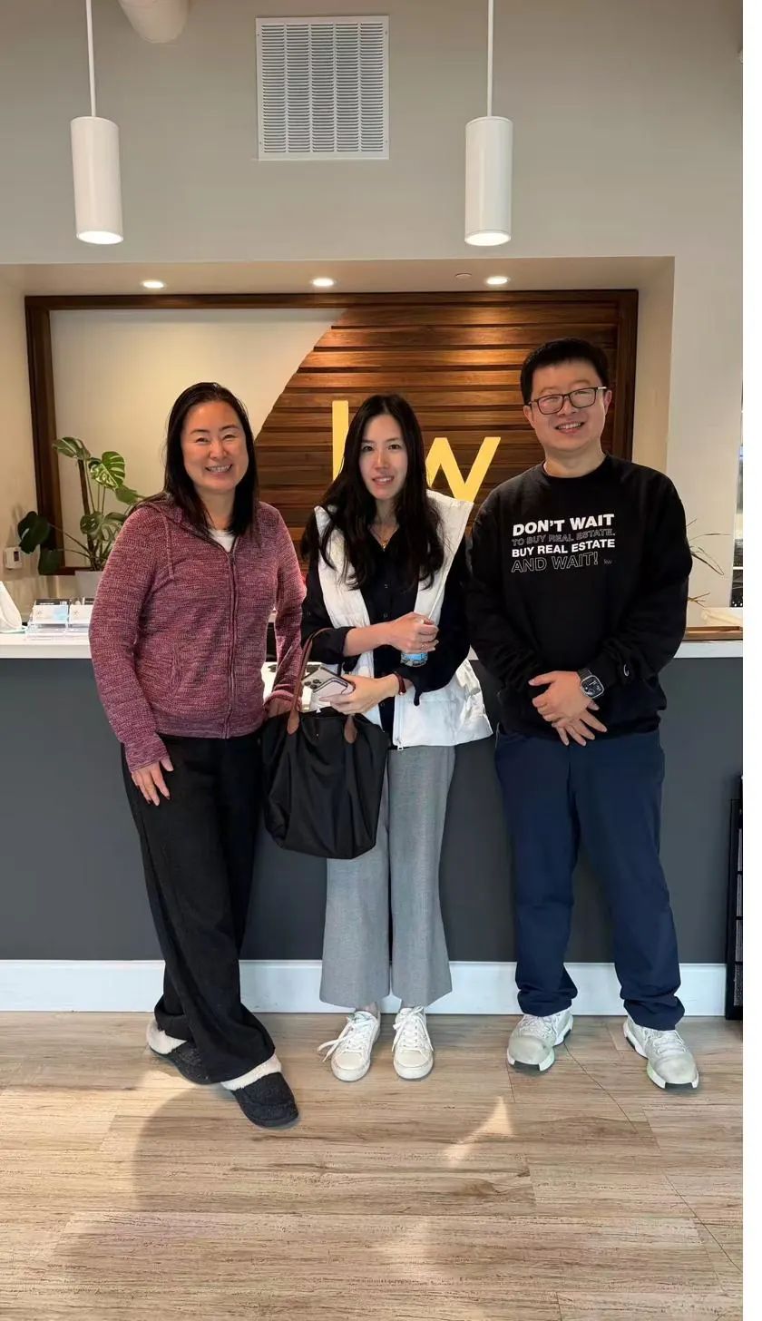 Diana and Mark with a mentee at the KW office